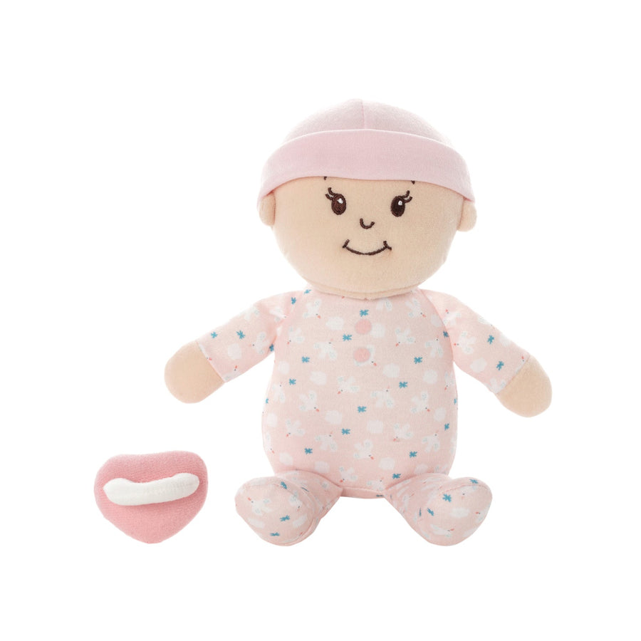 soft baby snuggle doll with peach skin that includes a magnetic pacifier 